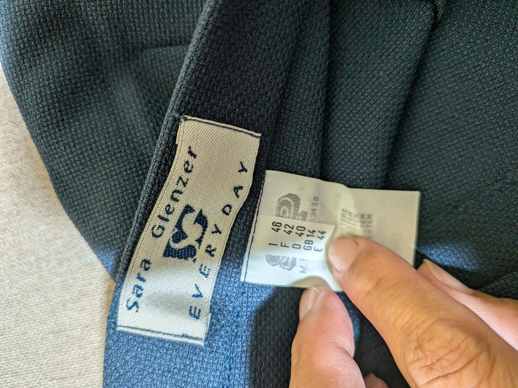 Sara Glenzer navy skirt suit, vintage blazer with three-button closure and straight skirt with slits.