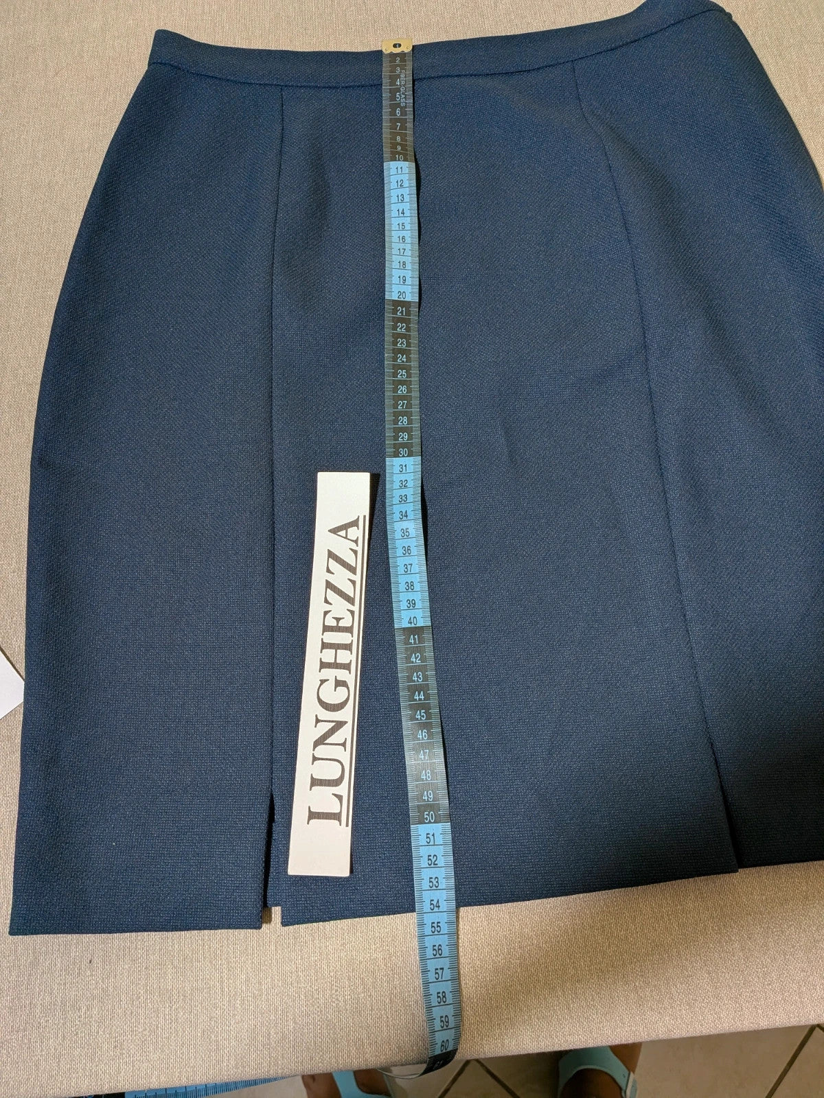 Sara Glenzer navy skirt suit, vintage blazer with three-button closure and straight skirt with slits.