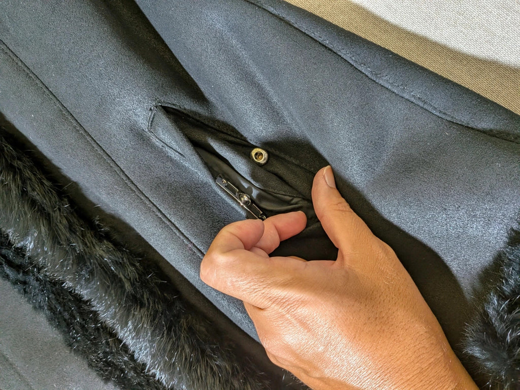 Bright Girl black jacket eco-leather with integrated hood and faux fur details.