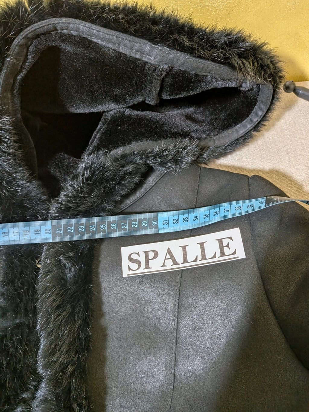 Bright Girl black jacket eco-leather with integrated hood and faux fur details.
