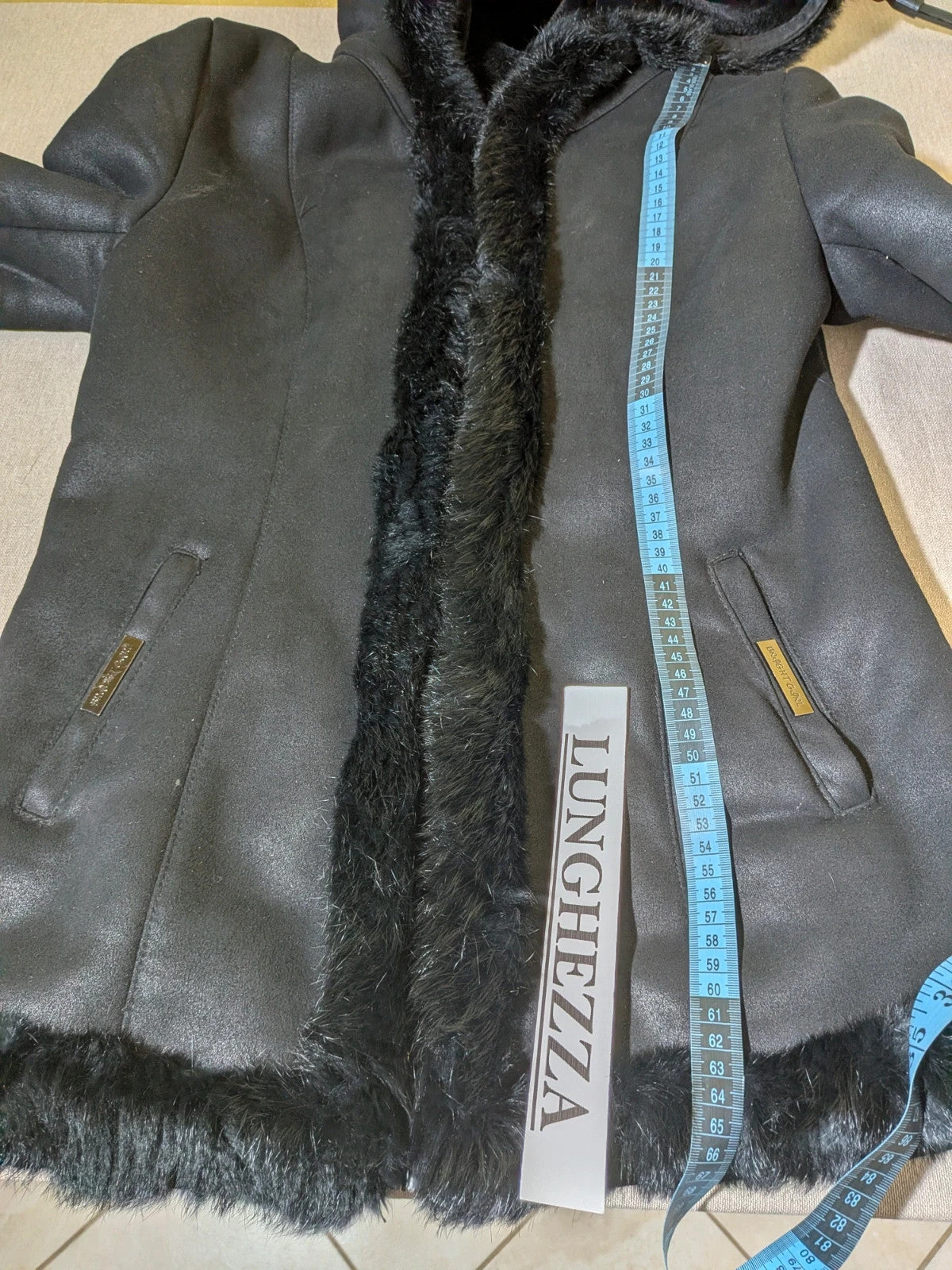 Bright Girl black jacket eco-leather with integrated hood and faux fur details.