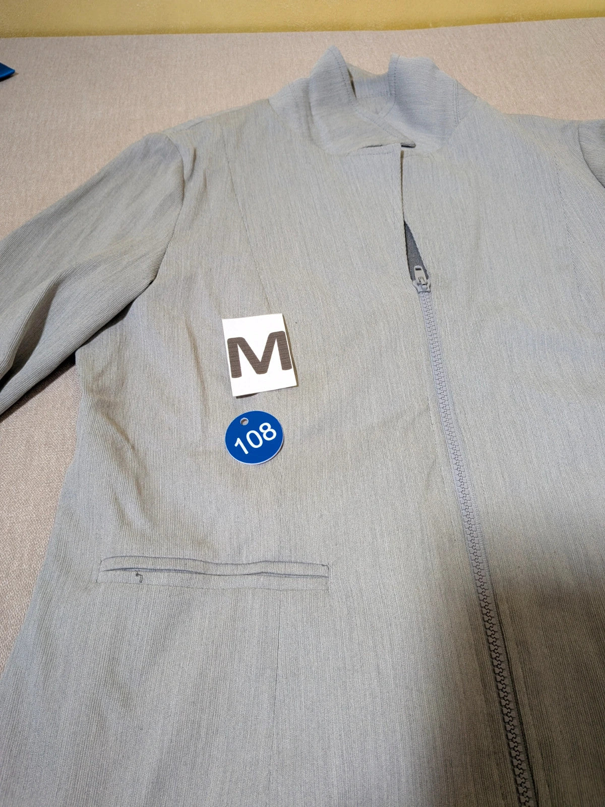M-Made in Italy grey skirt suit with zip jacket, classic lapel, pencil skirt design.