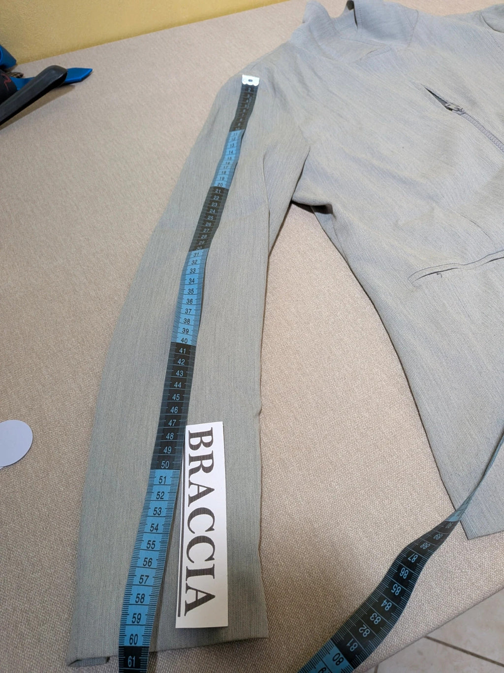 M-Made in Italy grey skirt suit with zip jacket, classic lapel, pencil skirt design.