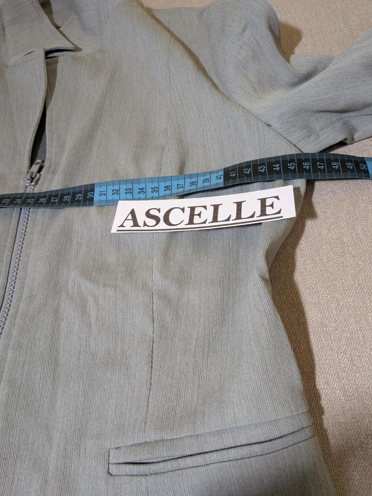 M-Made in Italy grey skirt suit with zip jacket, classic lapel, pencil skirt design.