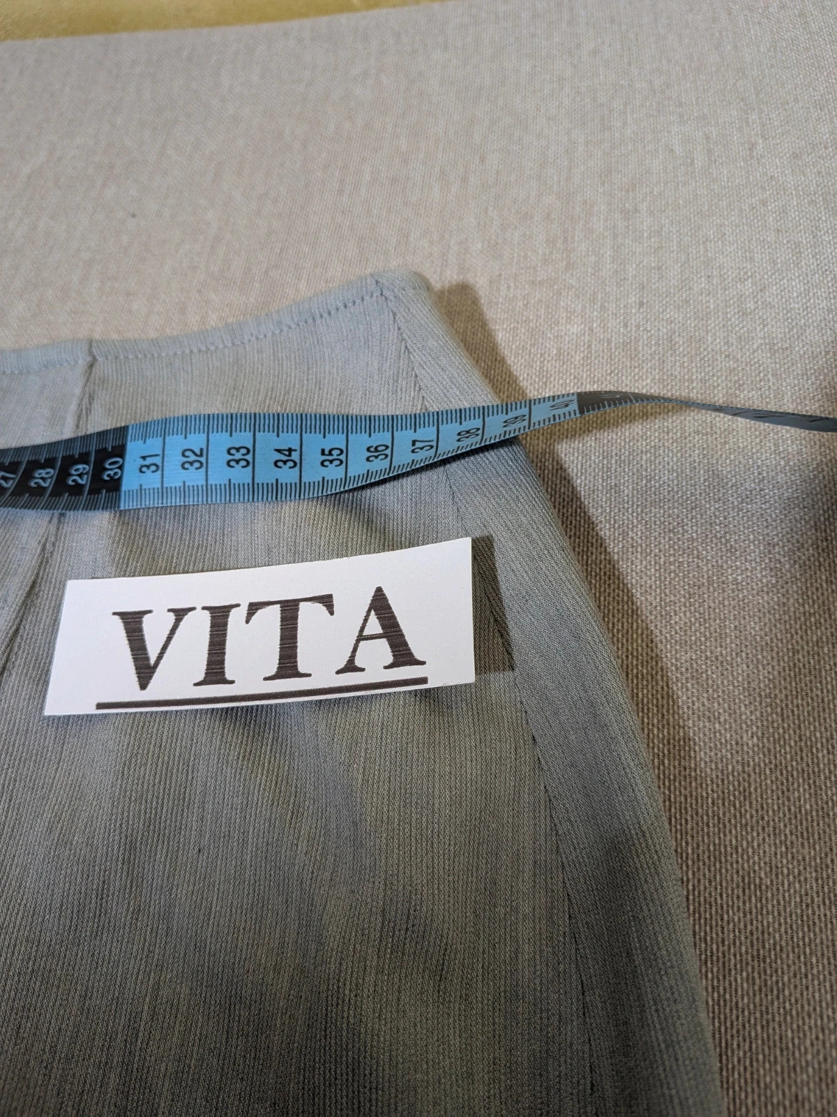 M-Made in Italy grey skirt suit with zip jacket, classic lapel, pencil skirt design.