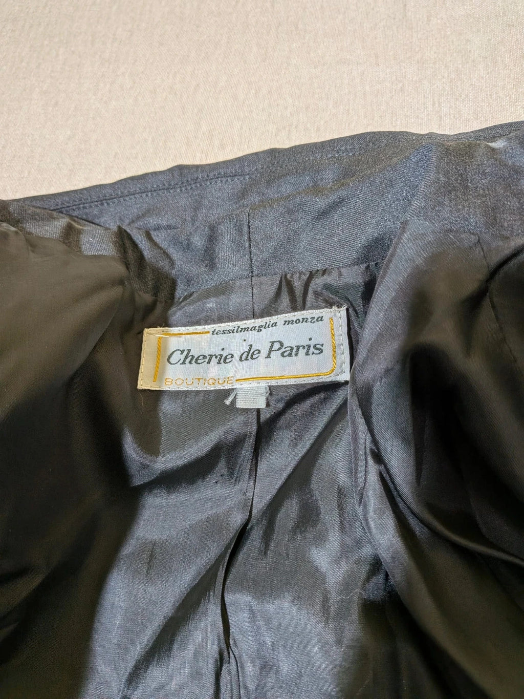 Cherie de Paris grey blazer and skirt suit, structured fit, gold button details, 100% wool.