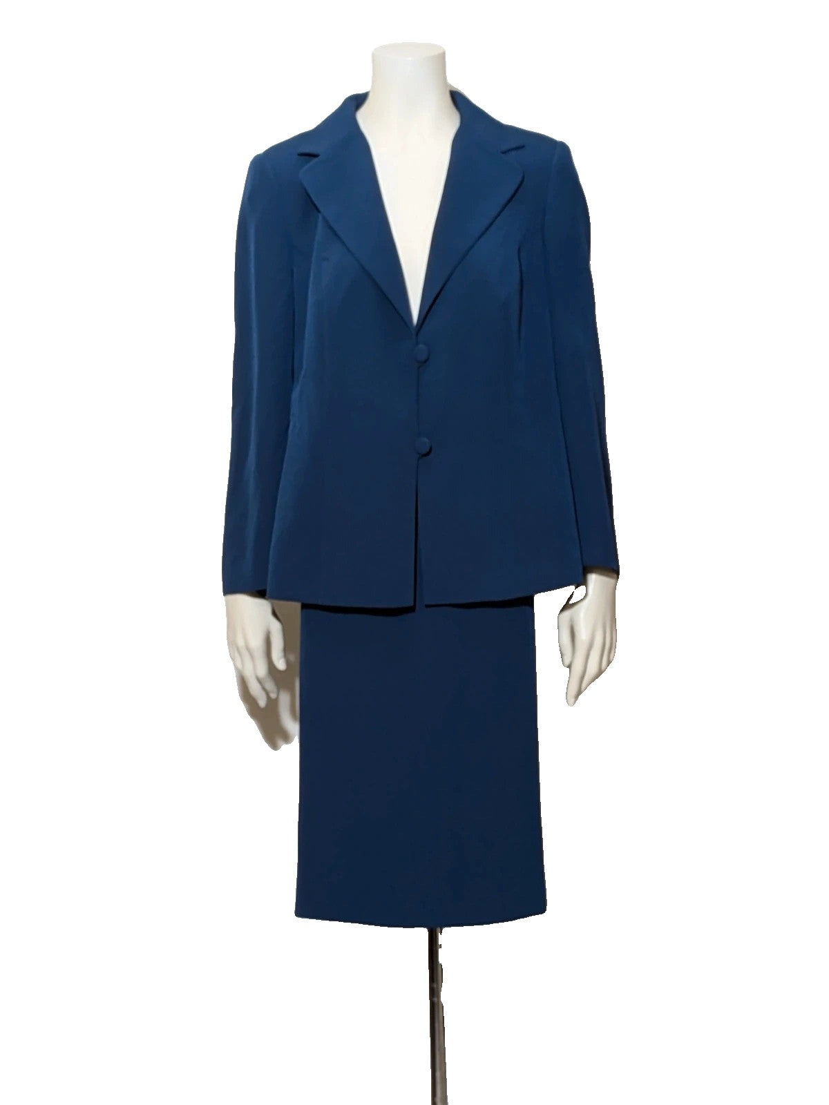 Romy blue skirt suit with classic blazer, two-button closure, and pencil skirt.