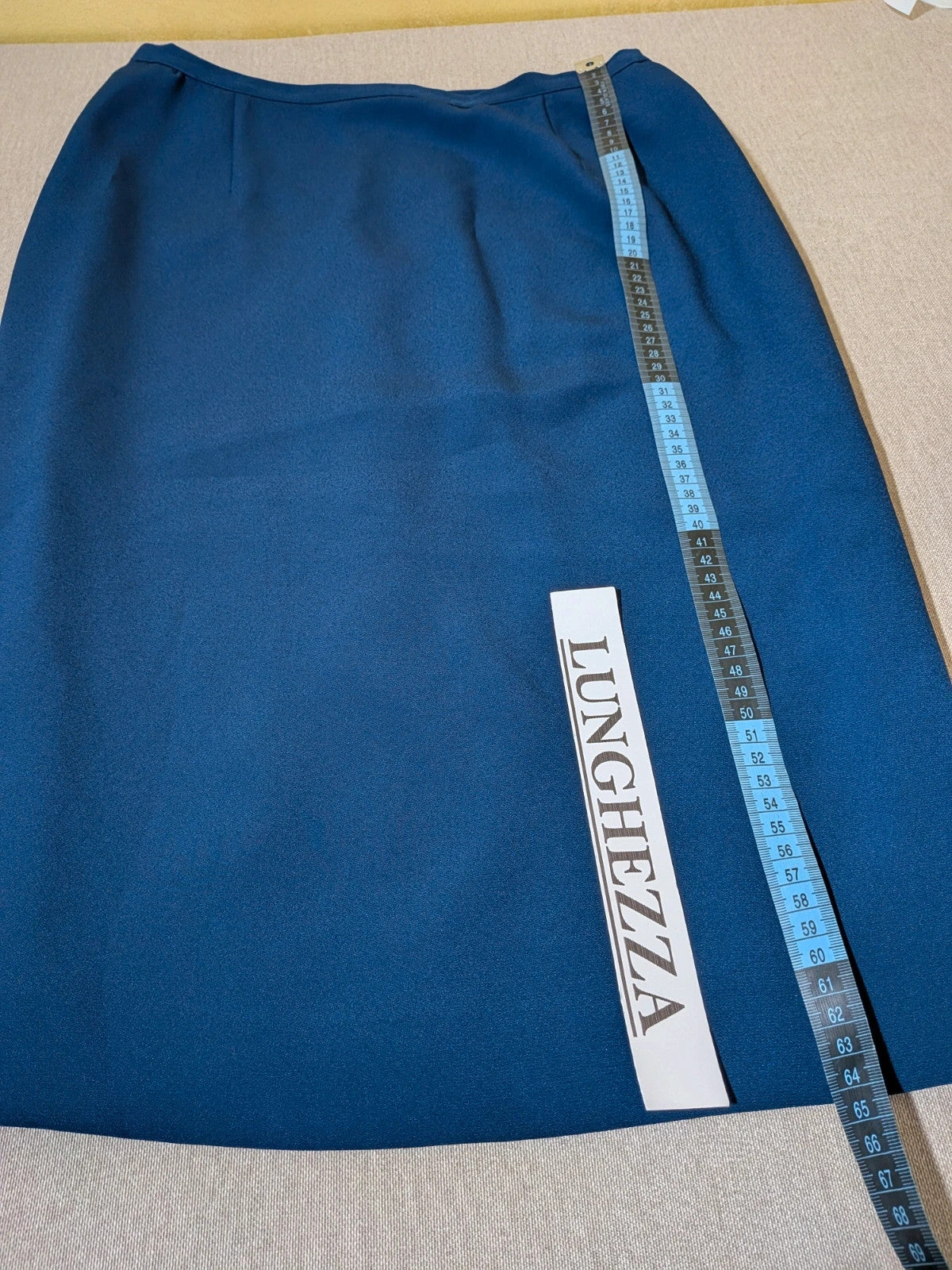 Romy blue skirt suit with classic blazer, two-button closure, and pencil skirt.