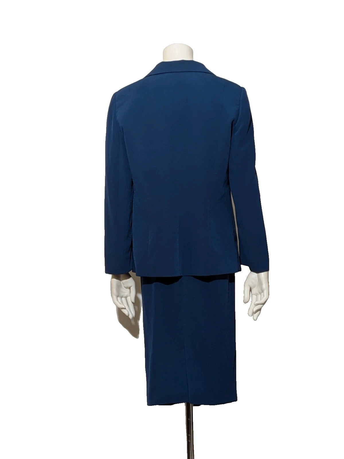 Romy blue skirt suit with classic blazer, two-button closure, and pencil skirt.