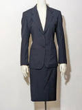 Made in Italy navy blazer suit with structured design and Pura Lana Vergine quality label.