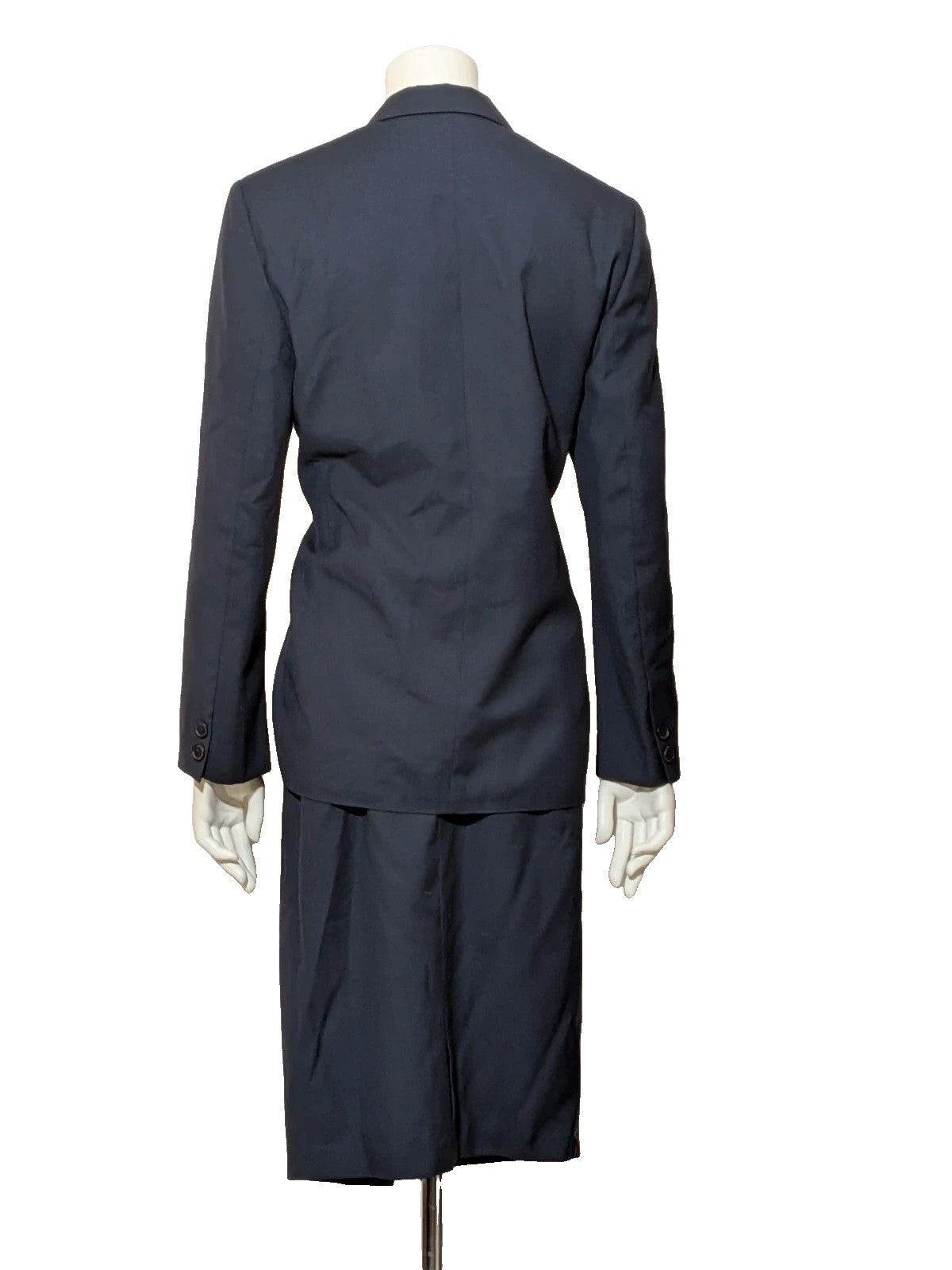 Made in Italy navy blazer suit with structured design and Pura Lana Vergine quality label.