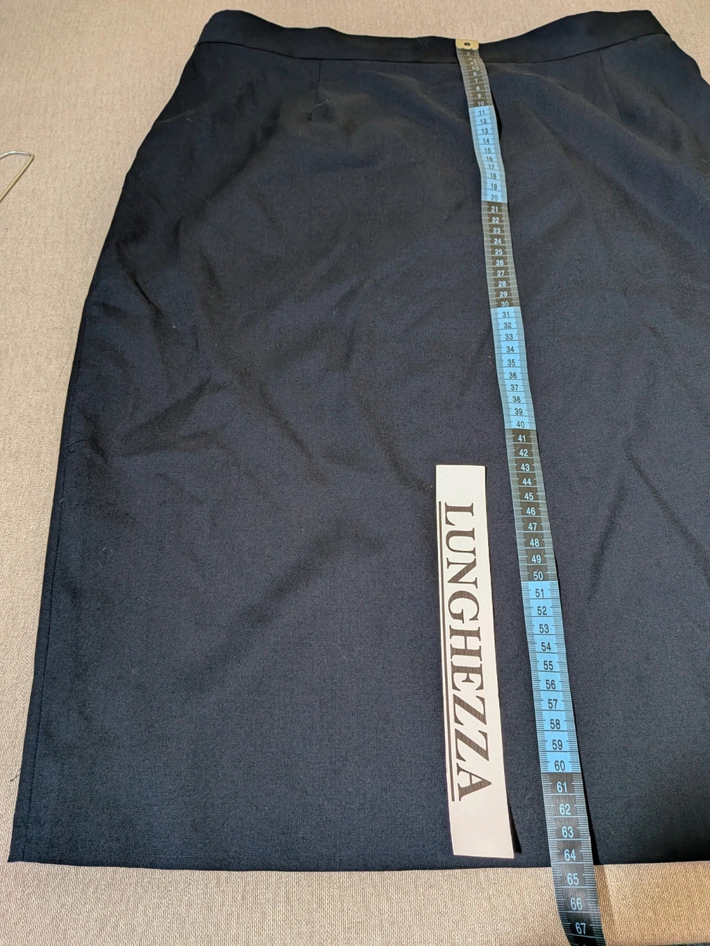 Made in Italy navy blazer suit with structured design and Pura Lana Vergine quality label.