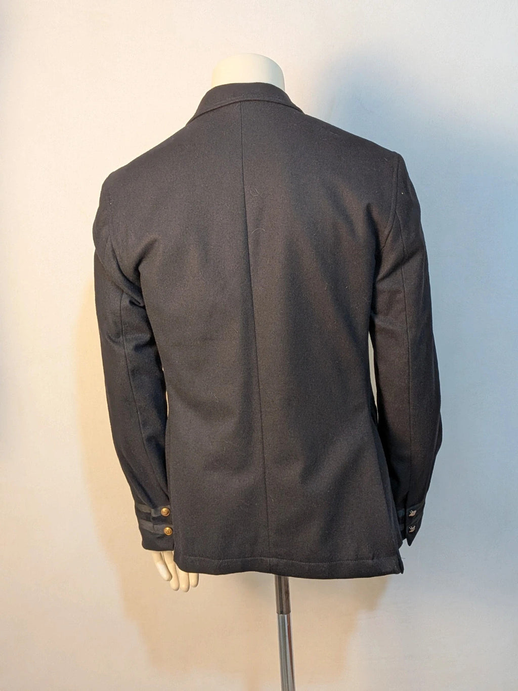 Zara Man navy blazer double-breasted with gold nautical buttons and striped lining.