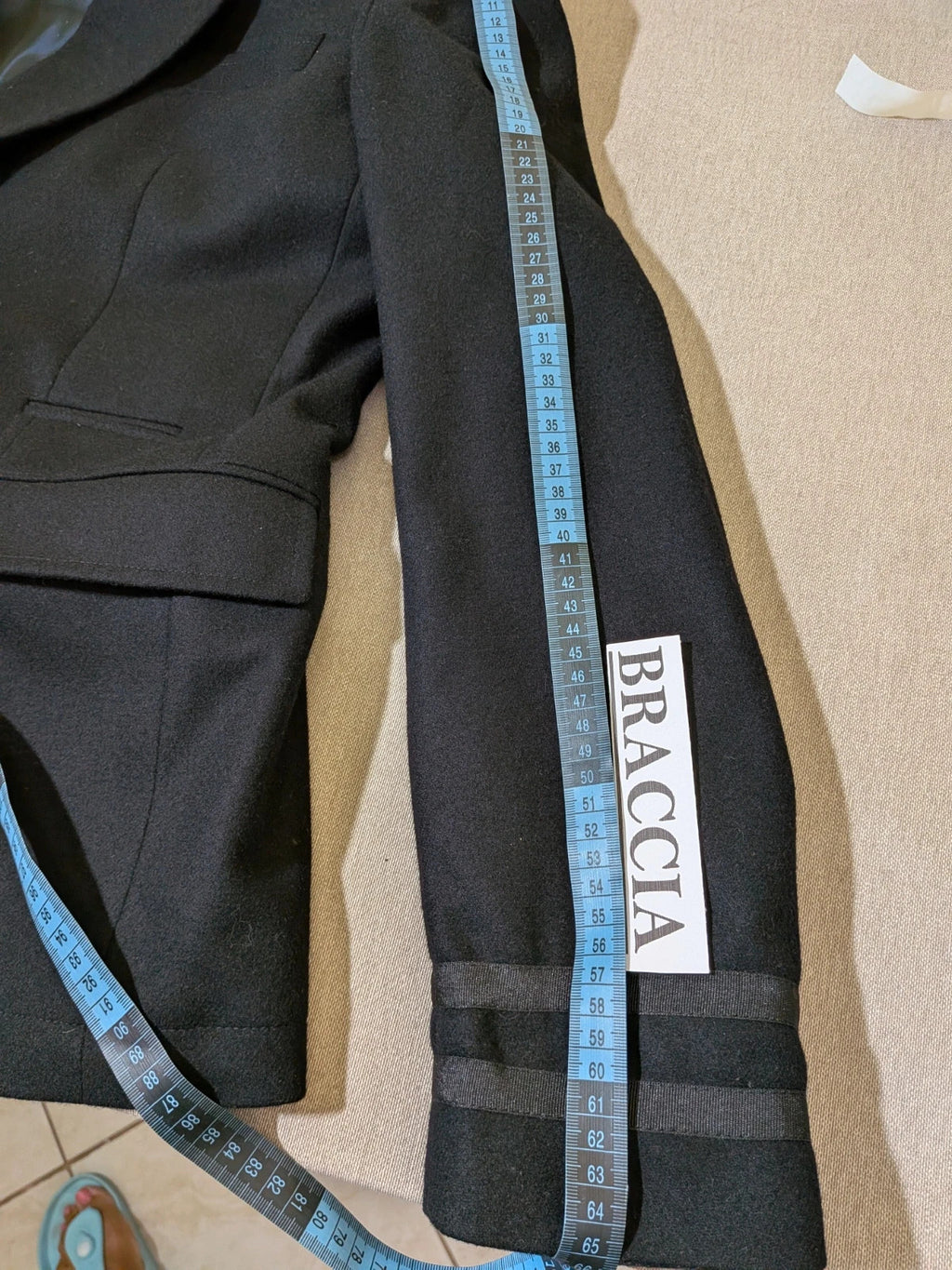 Zara Man navy blazer double-breasted with gold nautical buttons and striped lining.