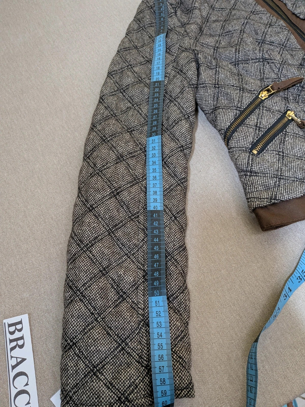 Zara Basic beige and brown quilted jacket with geometric pattern and suede trim.
