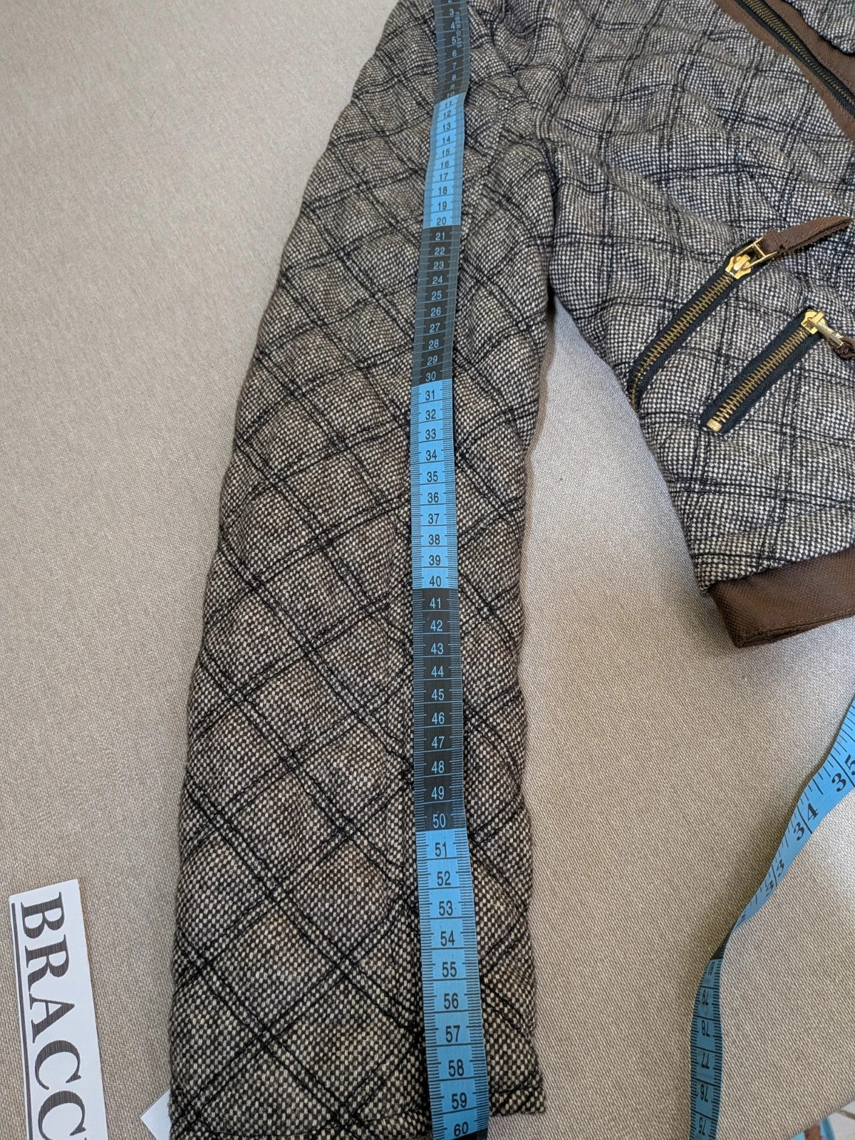 Zara Basic beige and brown quilted jacket with geometric pattern and suede trim.
