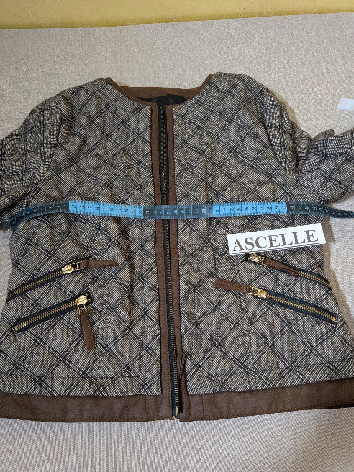 Zara Basic beige and brown quilted jacket with geometric pattern and suede trim.