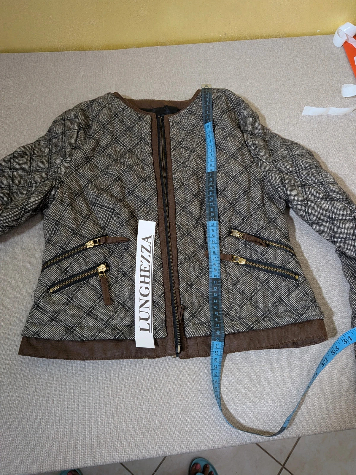Zara Basic beige and brown quilted jacket with geometric pattern and suede trim.