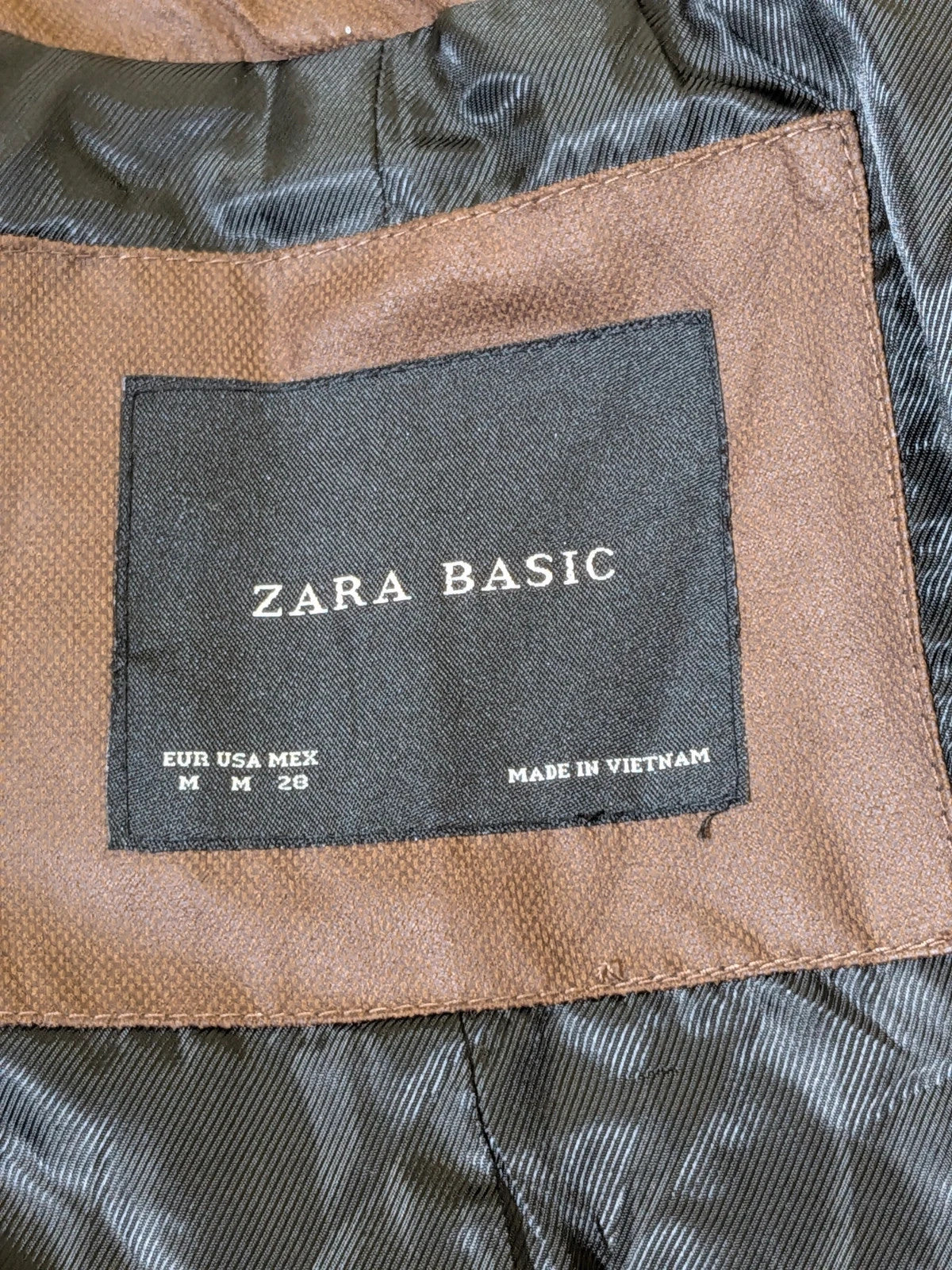Zara Basic beige and brown quilted jacket with geometric pattern and suede trim.