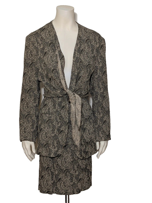 L'Officina Della Moda black and grey skirt suit with paisley jacquard pattern and bow front.