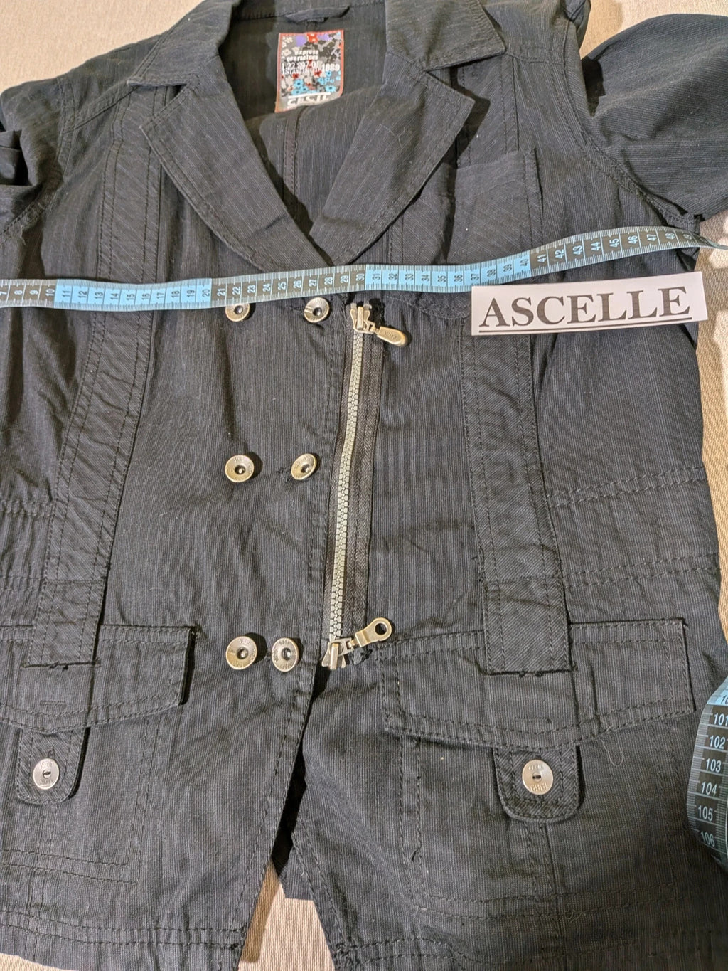 Cecil Y2K black suit with pinstripe pattern, double-breasted jacket and floral waistband pants.