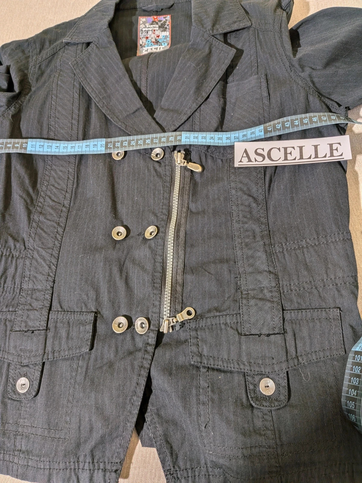 Cecil Y2K black suit with pinstripe pattern, double-breasted jacket and floral waistband pants.