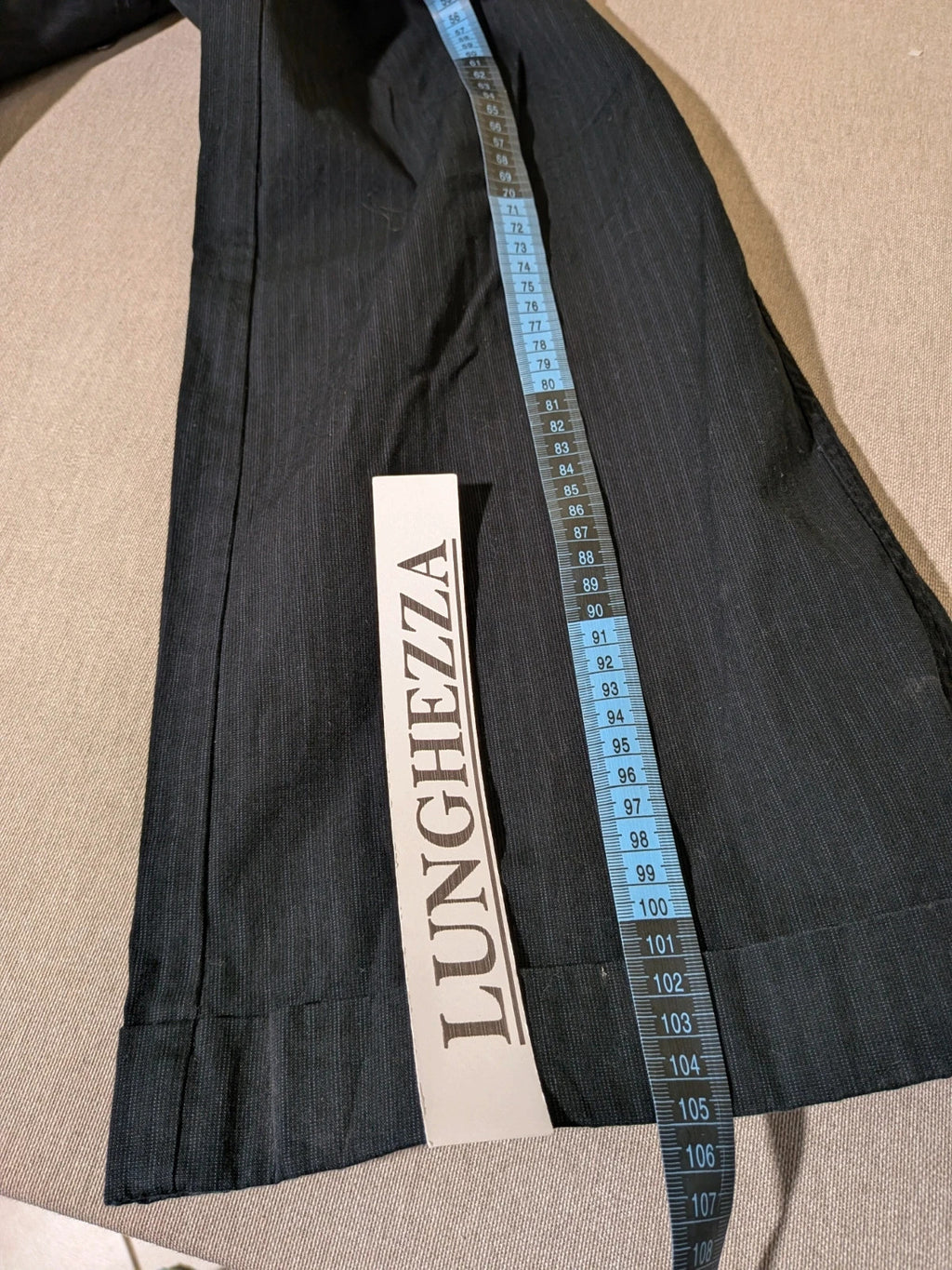 Cecil Y2K black suit with pinstripe pattern, double-breasted jacket and floral waistband pants.