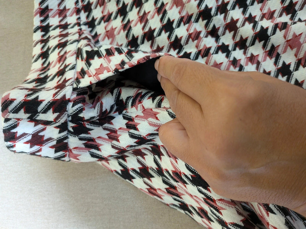 Orsay black skirt suit with houndstooth pattern and structured fabric, includes pockets.