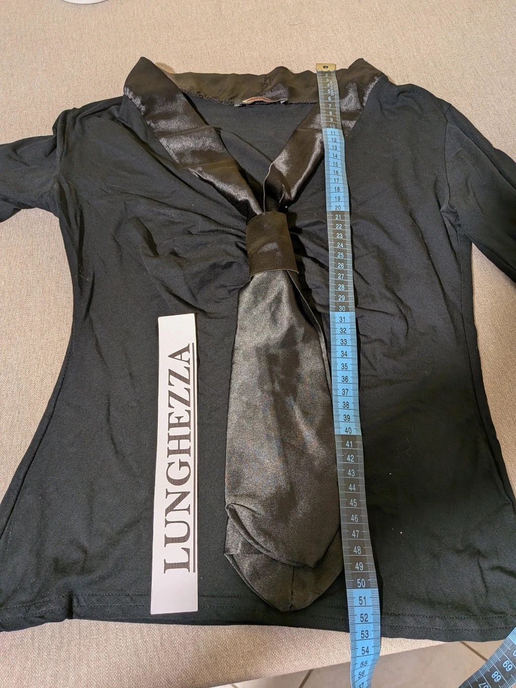Orsay black skirt suit with houndstooth pattern and structured fabric, includes pockets.