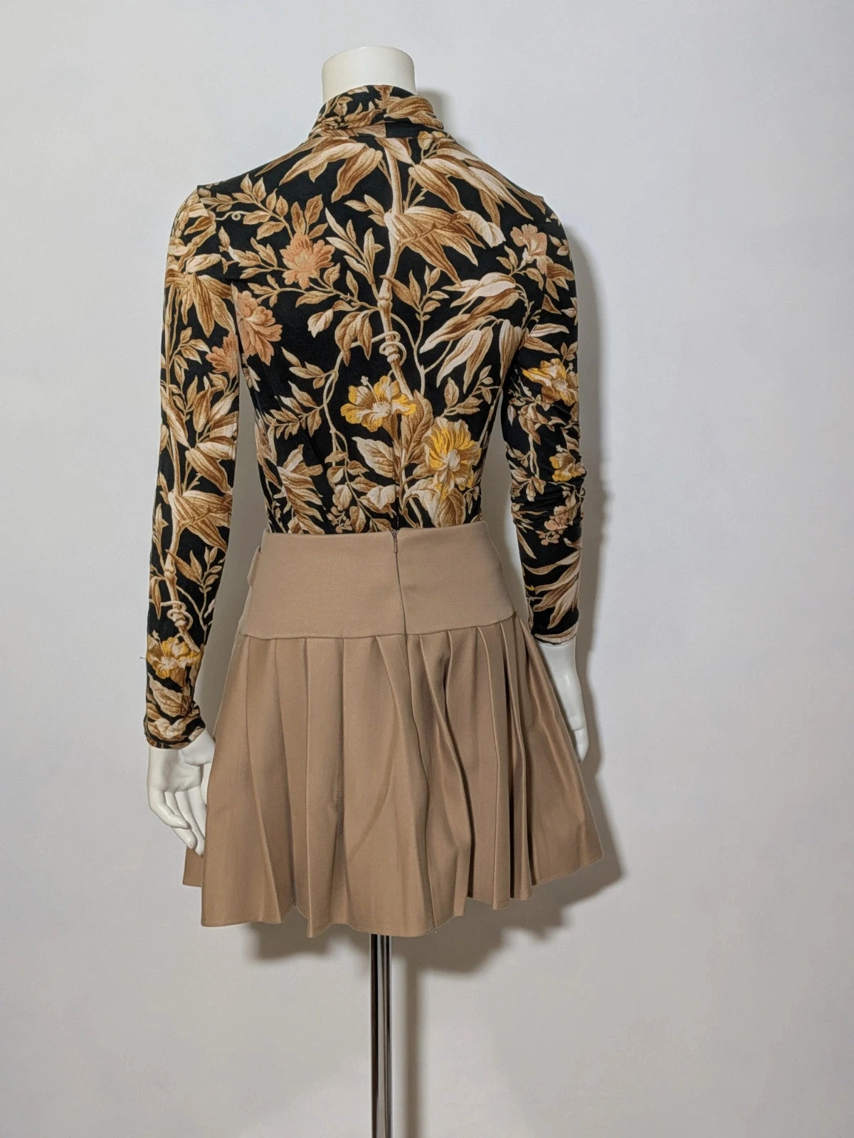 H&M floral high-neck top in beige, yellow and brown with long sleeves.