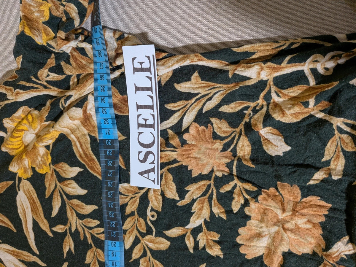H&M floral high-neck top in beige, yellow and brown with long sleeves.