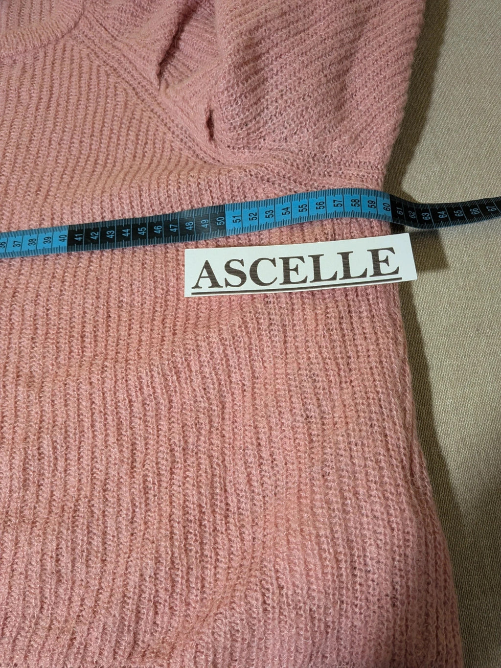 KOCCA pink sweater with balloon sleeves and metallic logo tag, made from mohair blend.