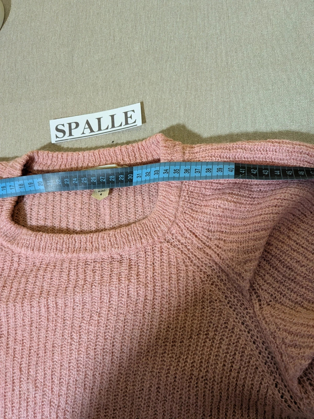 KOCCA pink sweater with balloon sleeves and metallic logo tag, made from mohair blend.