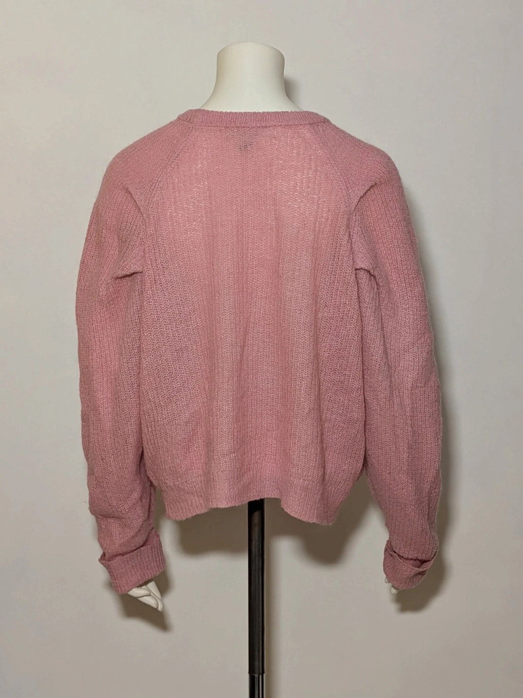 KOCCA pink sweater with balloon sleeves and metallic logo tag, made from mohair blend.