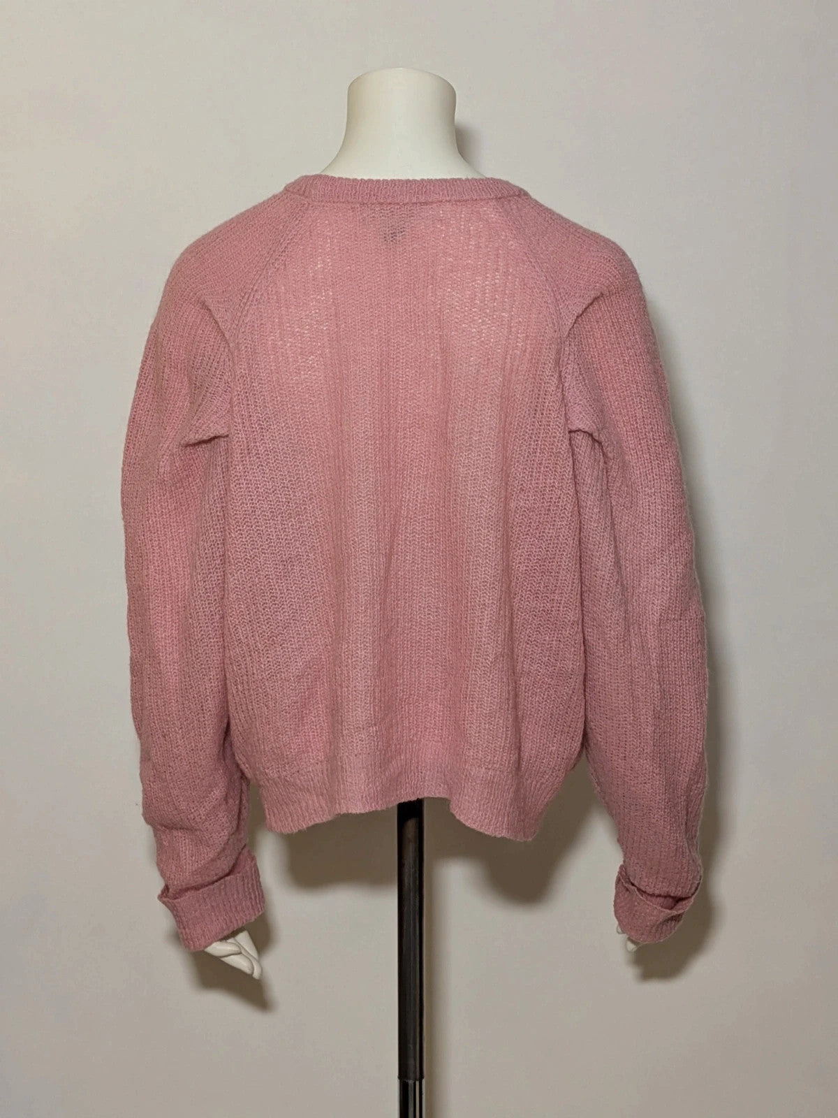 KOCCA pink sweater with balloon sleeves and metallic logo tag, made from mohair blend.