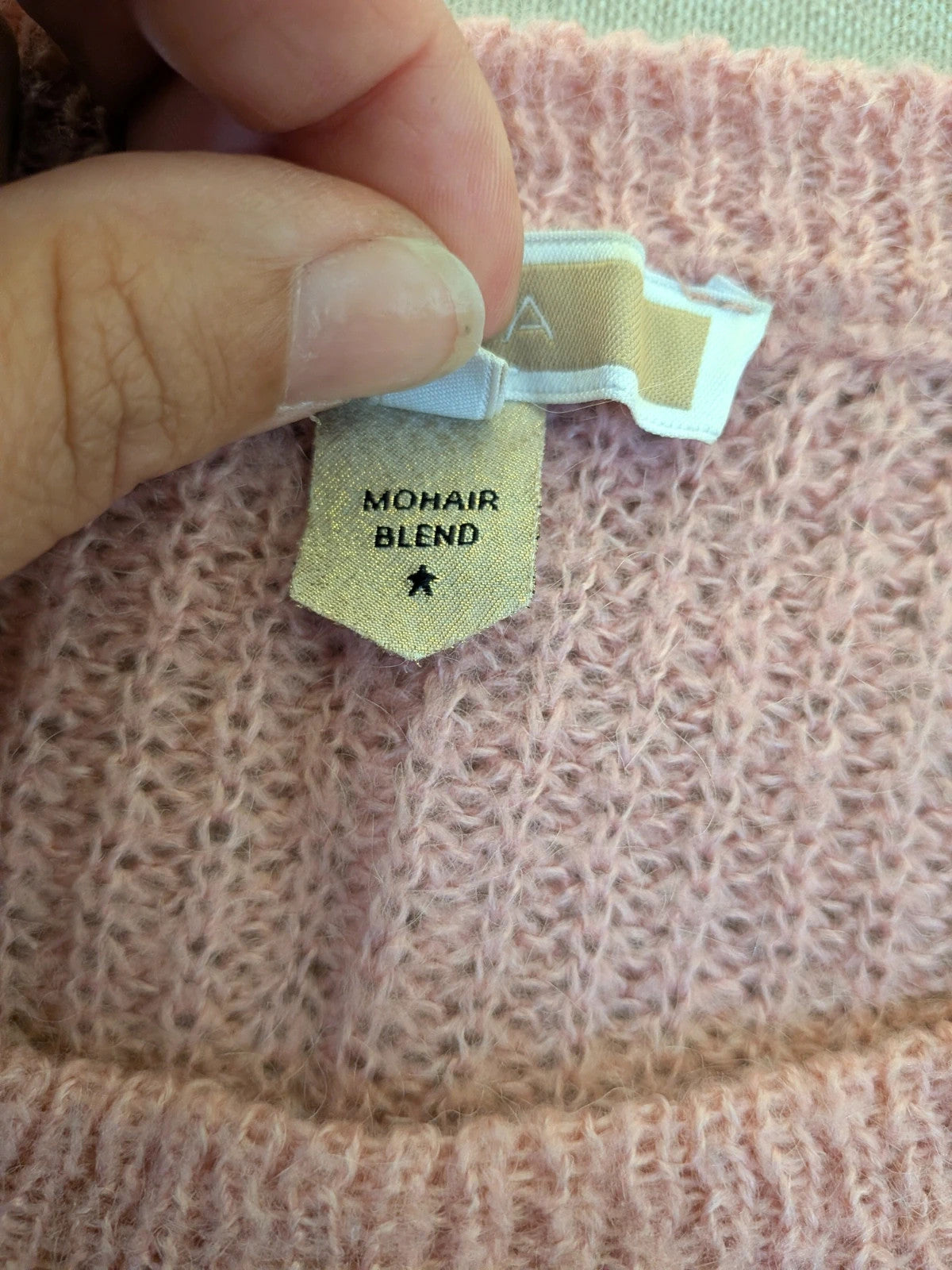 KOCCA pink sweater with balloon sleeves and metallic logo tag, made from mohair blend.