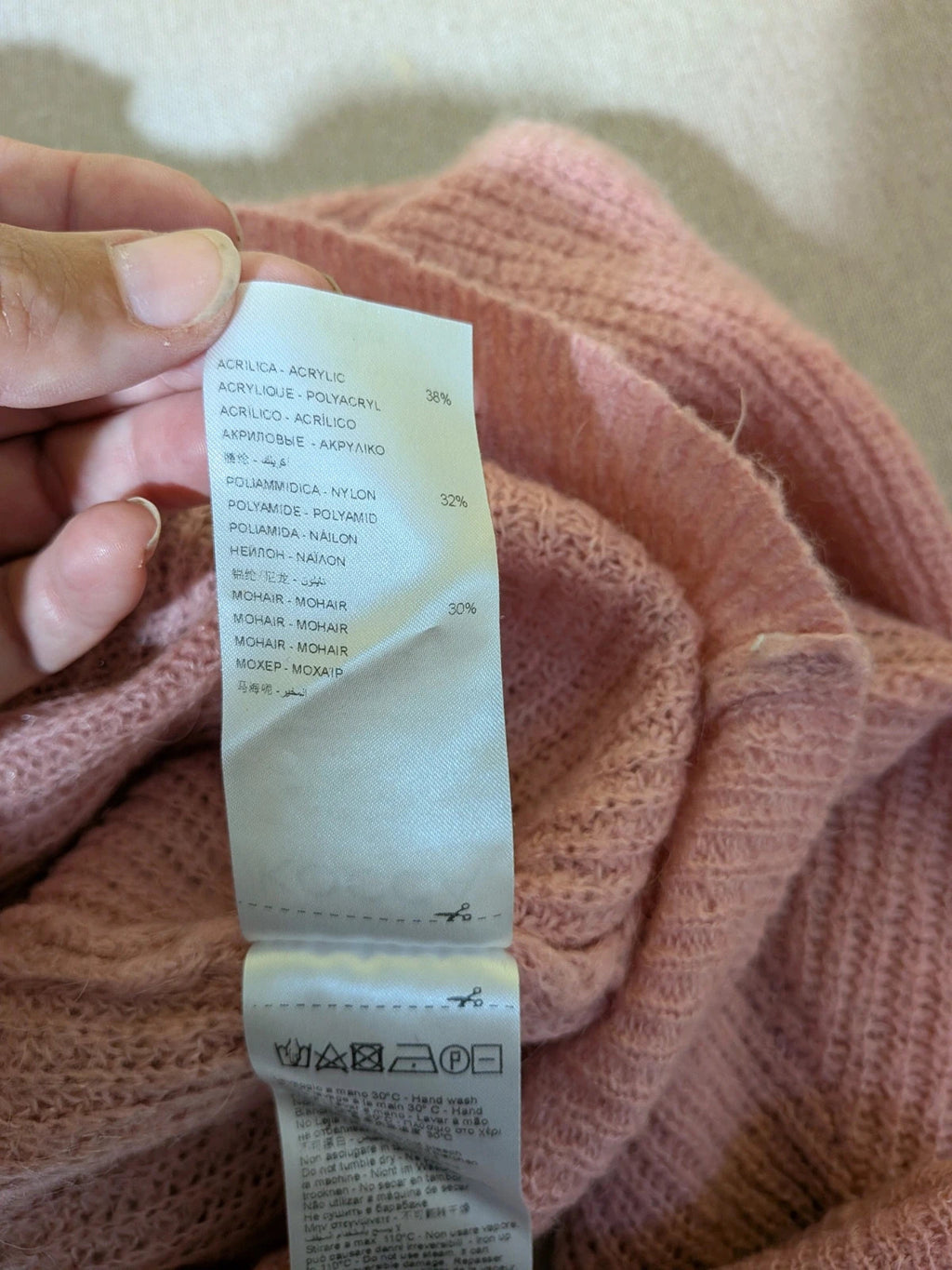 KOCCA pink sweater with balloon sleeves and metallic logo tag, made from mohair blend.