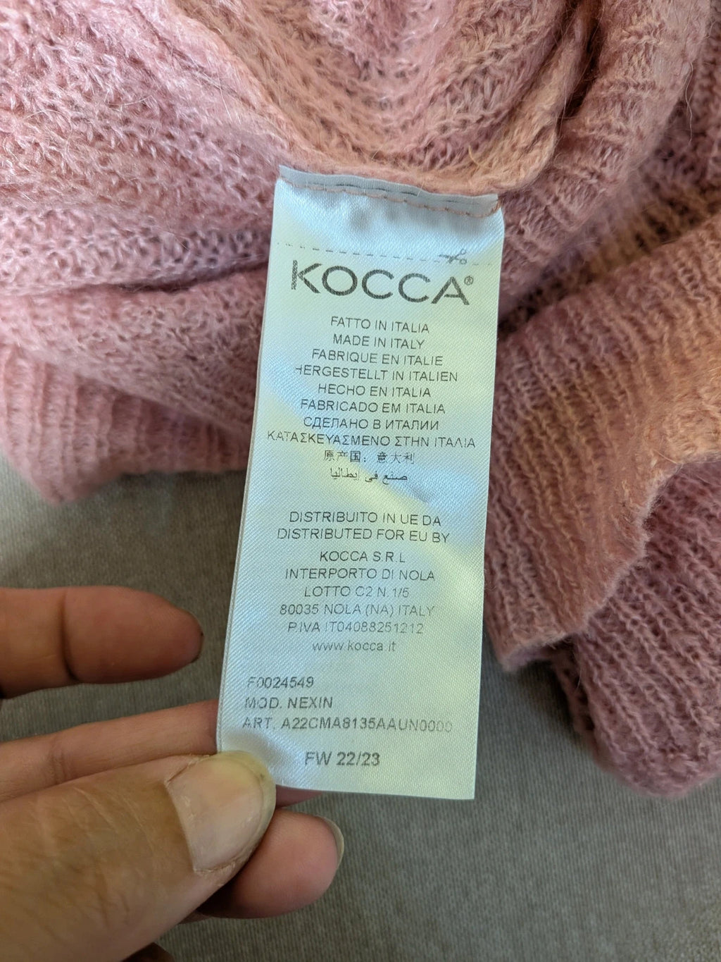 KOCCA pink sweater with balloon sleeves and metallic logo tag, made from mohair blend.