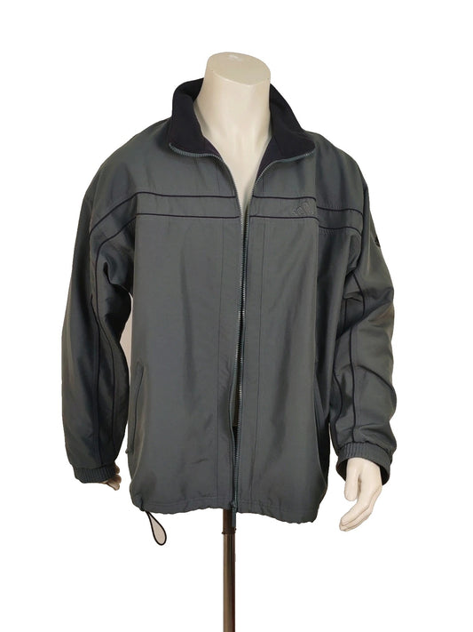 Adidas grey track jacket, high collar, zip closure, tonal details, vintage 90s style.