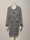 Liola grey silver skirt suit with jacquard floral pattern and short collar jacket.