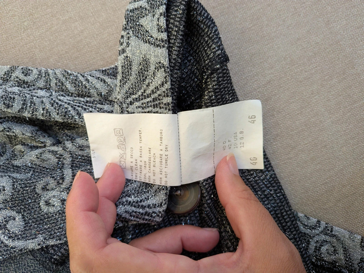Liola grey silver skirt suit with jacquard floral pattern and short collar jacket.