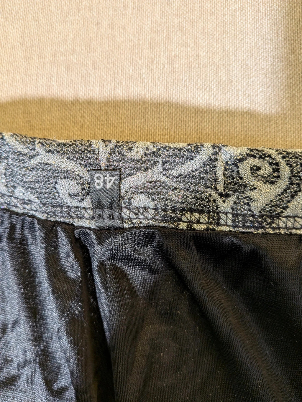 Liola grey silver skirt suit with jacquard floral pattern and short collar jacket.
