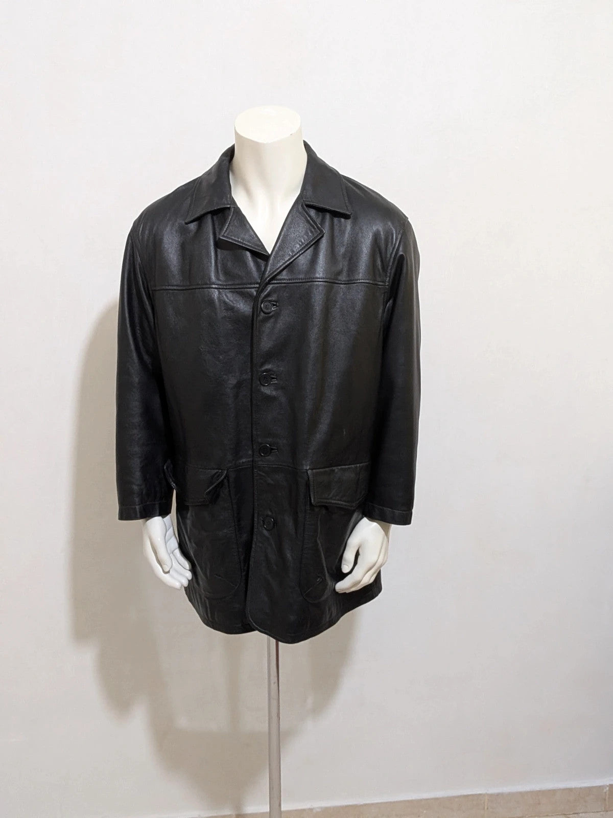 SCOUT black leather jacket vintage style with button closure and large front pockets.