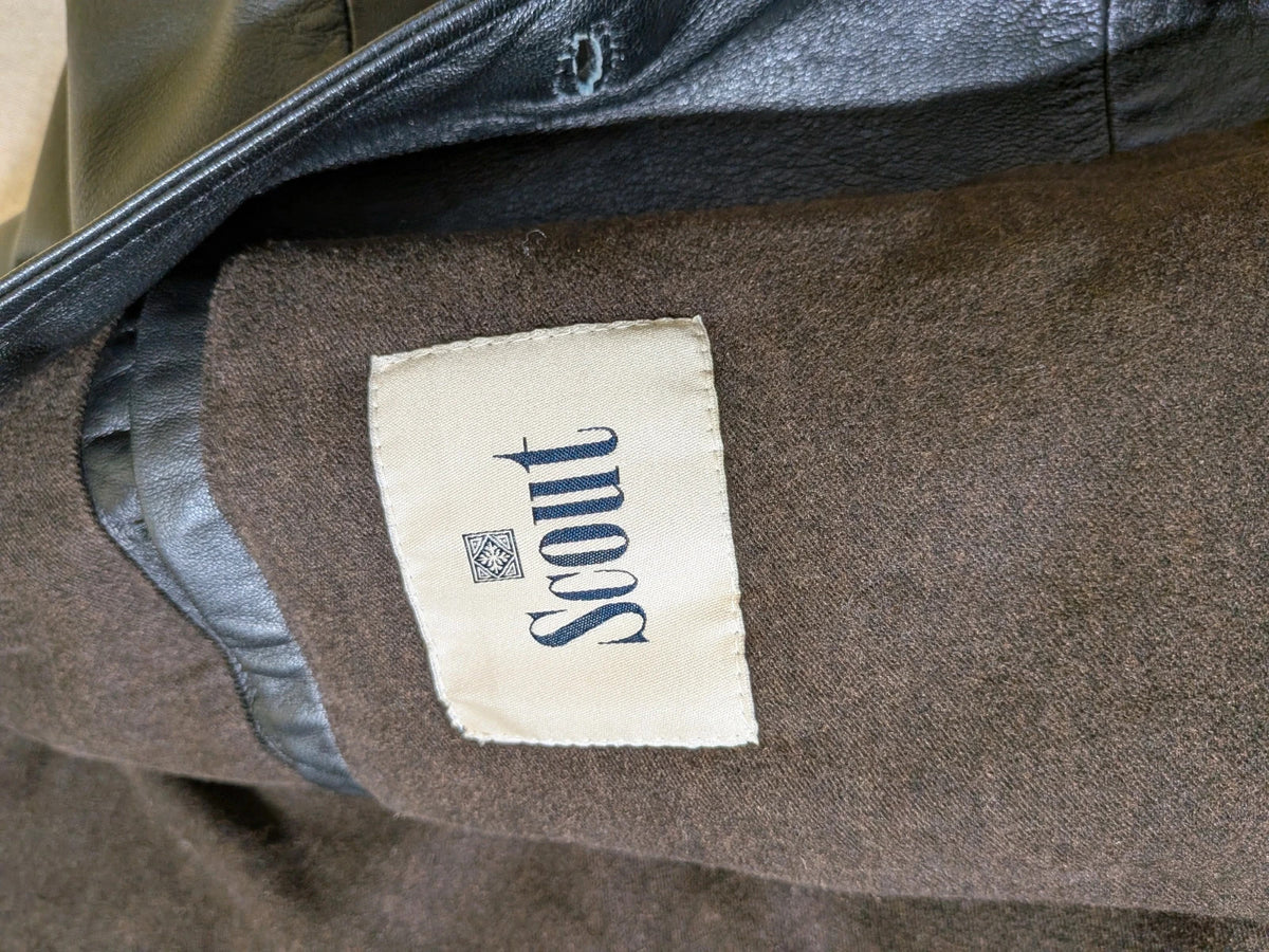 SCOUT black leather jacket vintage style with button closure and large front pockets.