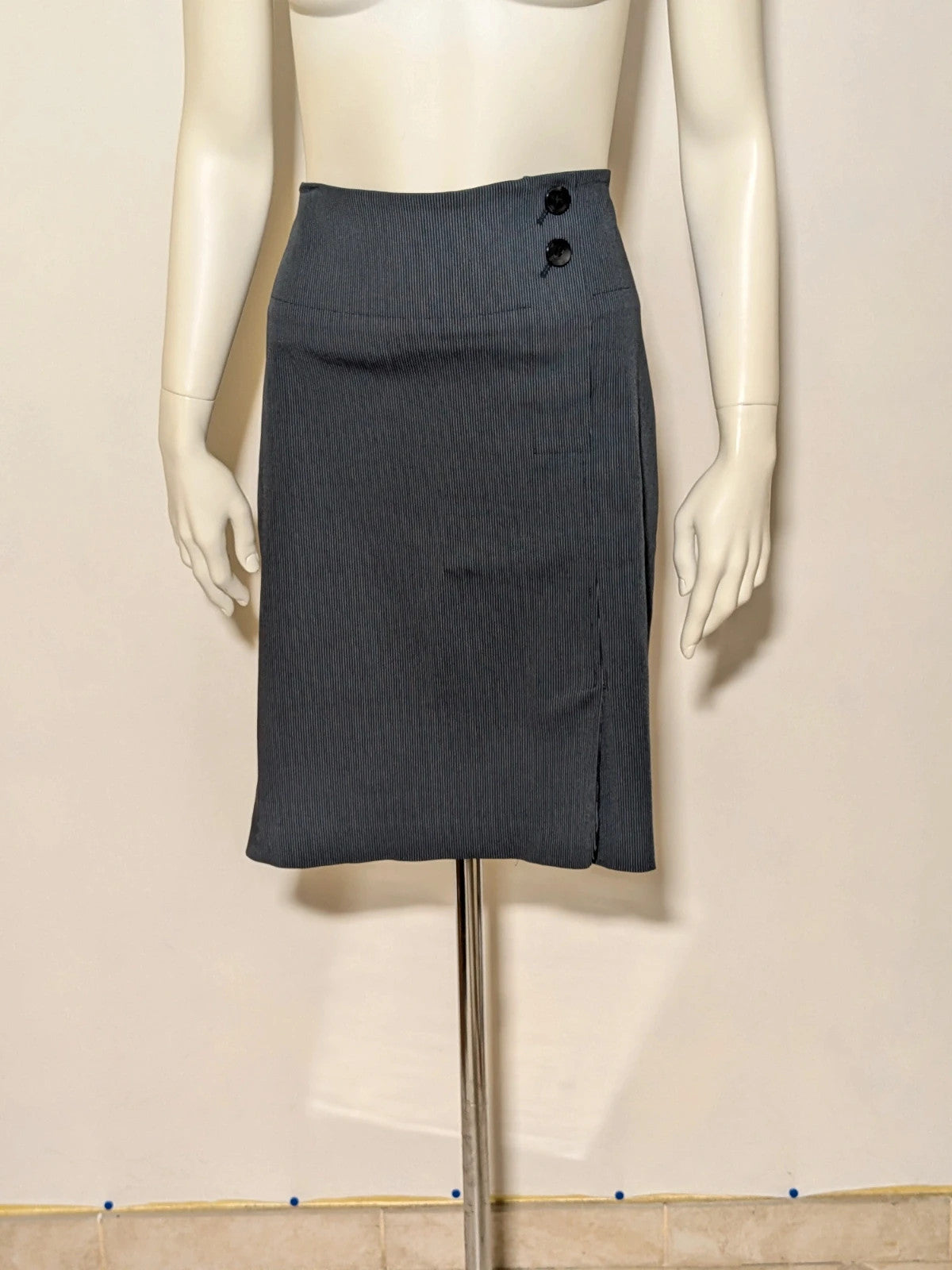 Mango Suit grey skirt suit with pinstripe pattern, single-button blazer, elegant pencil skirt.