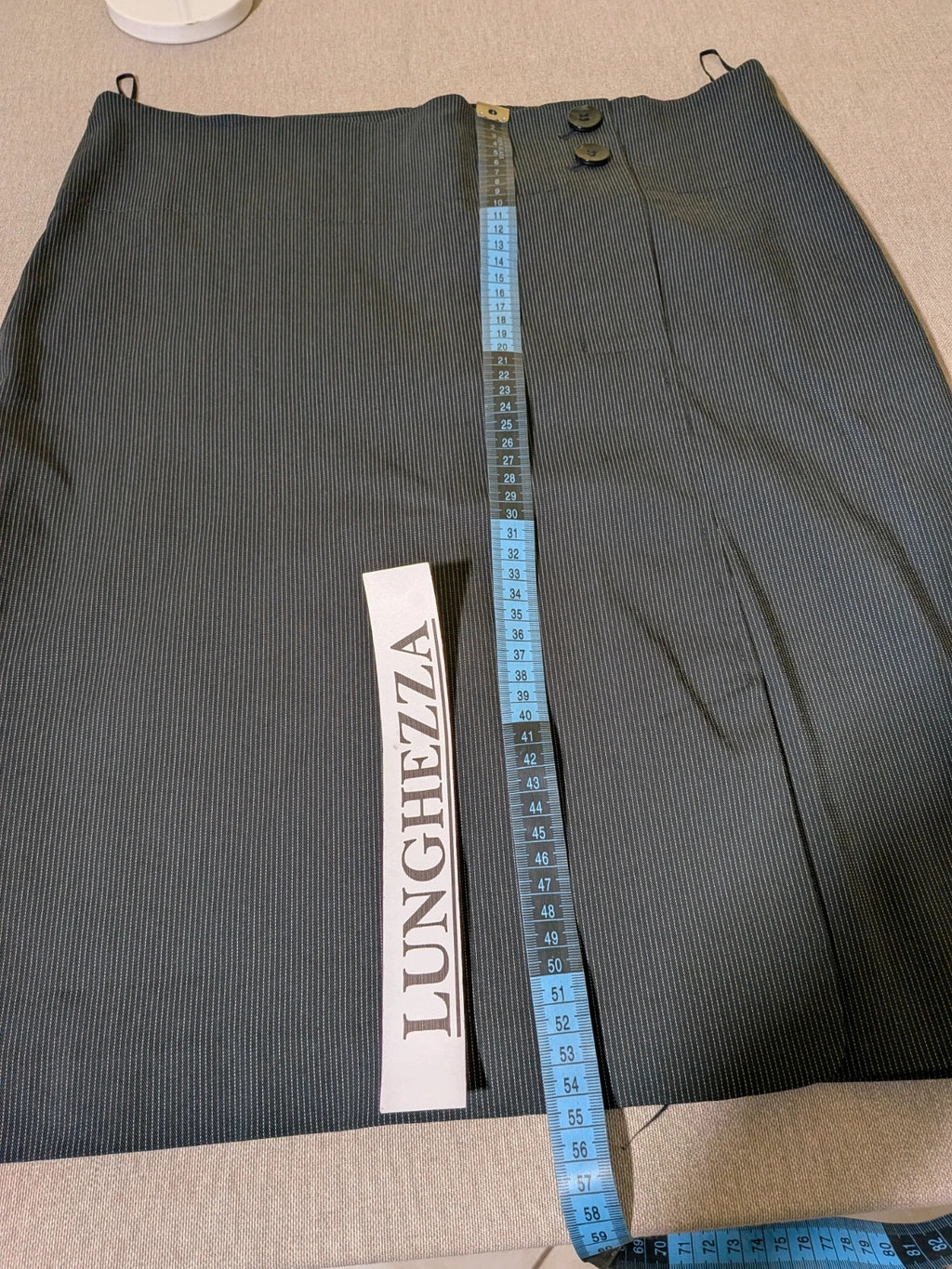 Mango Suit grey skirt suit with pinstripe pattern, single-button blazer, elegant pencil skirt.