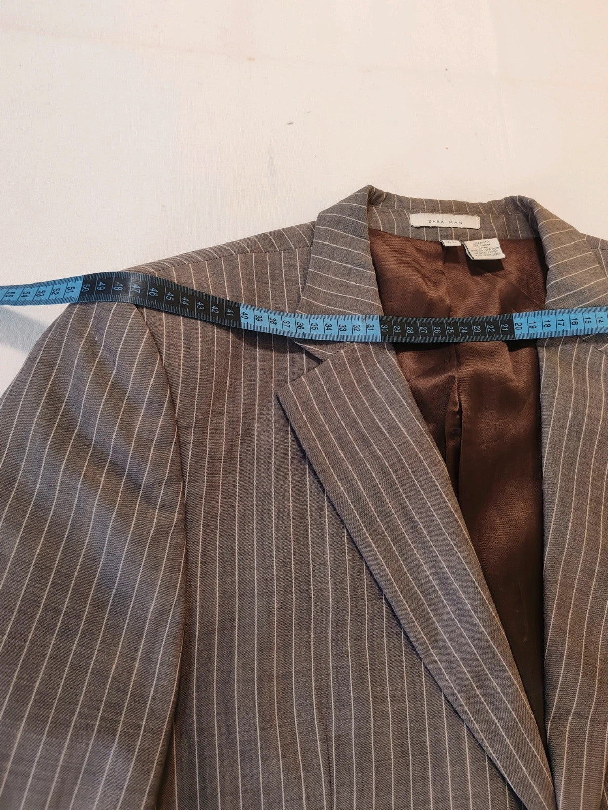Zara Man brown suit jacket and pants, 100% wool, vertical pinstripe pattern.