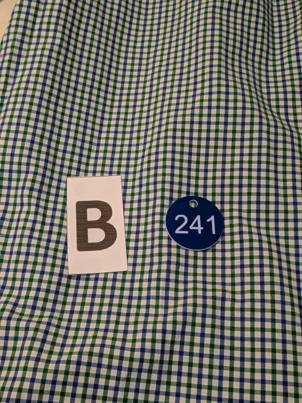 Ralph Lauren blue and green checkered shirt with embroidered dark blue Pony logo.