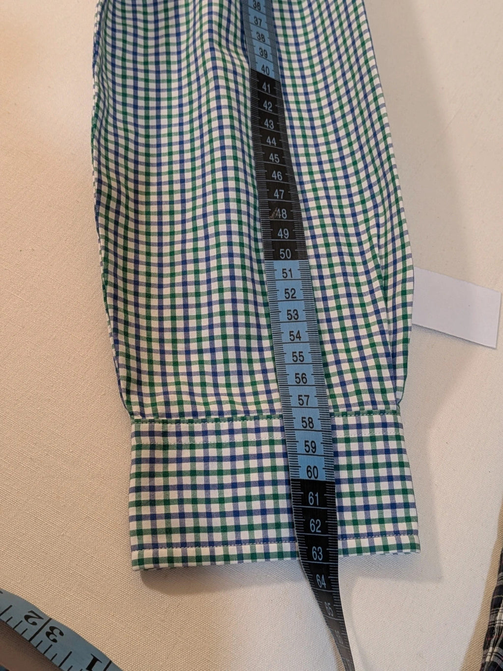 Ralph Lauren blue and green checkered shirt with embroidered dark blue Pony logo.