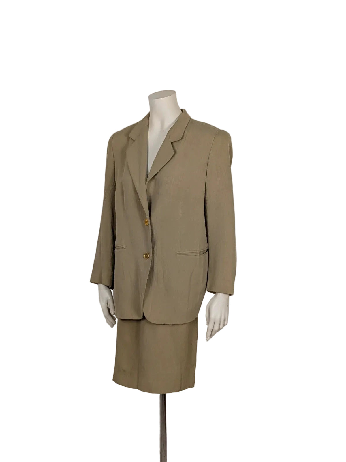 Krizia beige skirt suit with structured jacket, gold buttons, and pleated silk fabric.